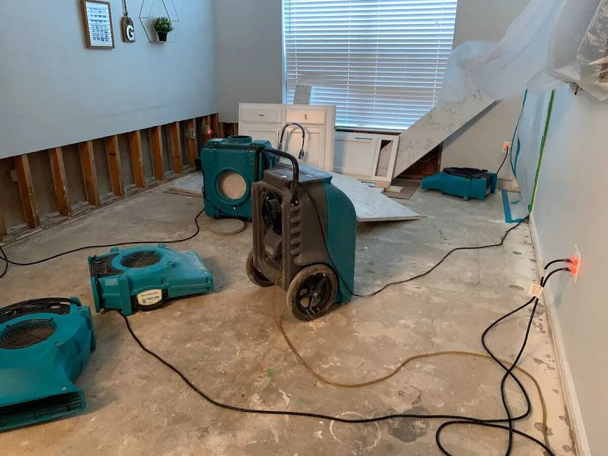 Dehumidifier in flood-cut room for Water Damage Restoration in Brownfields