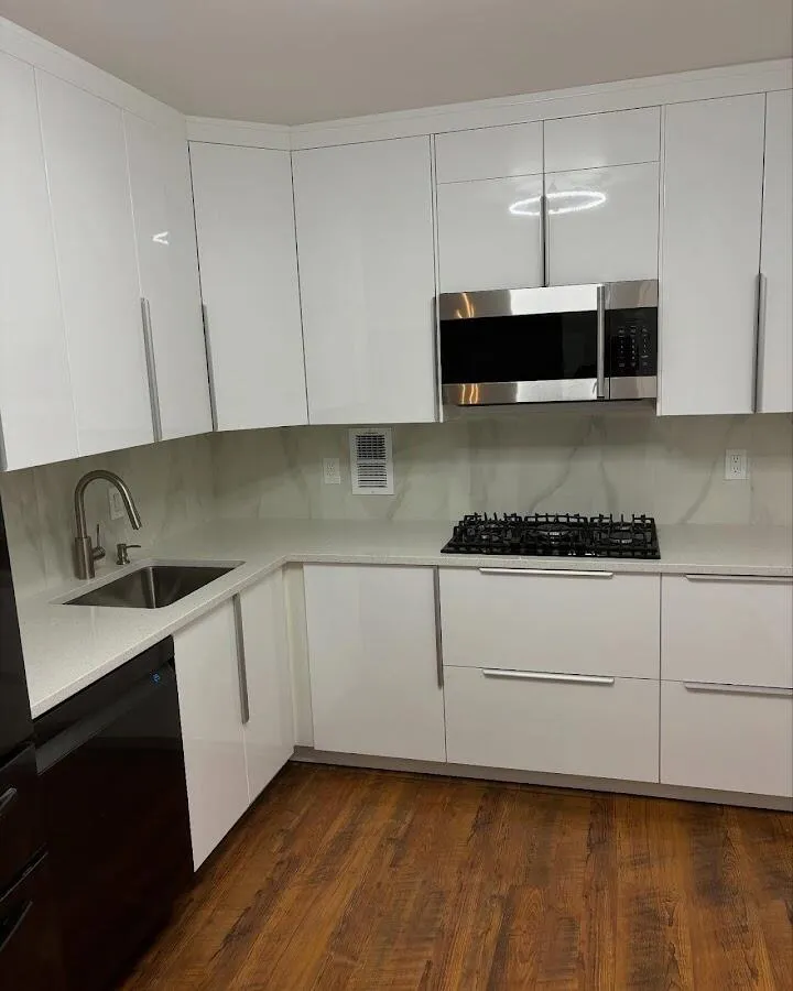 Restored kitchen with white cabinets after water damage in Brownfields
