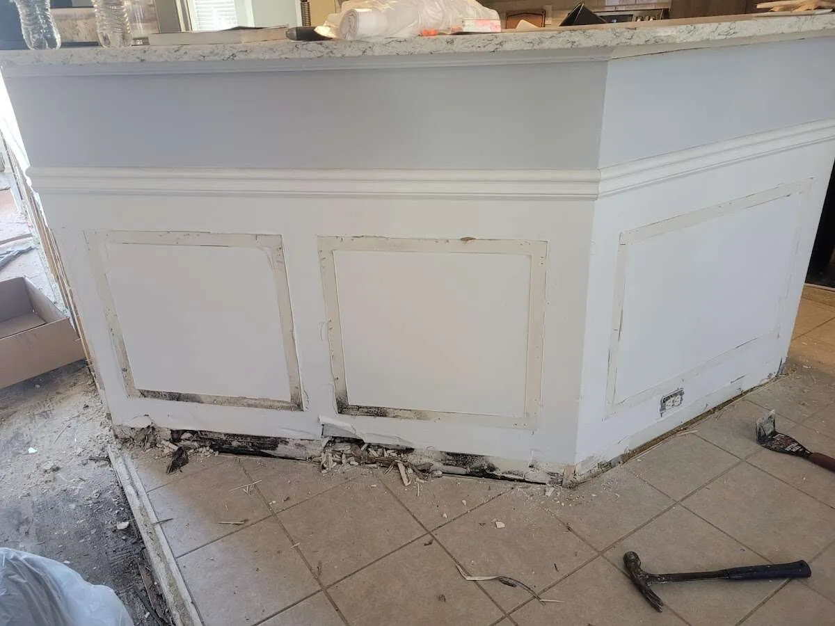 Water damage and mold on kitchen during Storm Damage Restoration in Brownfields